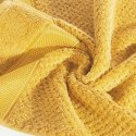 Ręcznik Milan 70x140 musztardowy frotte 500g/m2 bawełniany z bordiurą przetykaną błyszczącą nicią Eurofirany Ręcznik Milan 70x140 musztardowy frotte 500g/m2 bawełniany z bordiurą przetykaną błyszczącą nicią Eurofirany