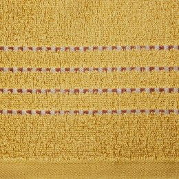 Ręcznik 50x90 Fiore musztardowy 500g/m2 frotte ozdobiony bordiurą w postaci cienkich paseczków Eurofirany