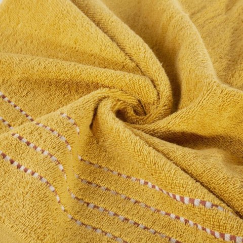 Ręcznik 50x90 Fiore musztardowy 500g/m2 frotte ozdobiony bordiurą w postaci cienkich paseczków Eurofirany Ręcznik 50x90 Fiore musztardowy 500g/m2 frotte ozdobiony bordiurą w postaci cienkich paseczków Eurofirany