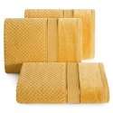 Ręcznik Jessi 30x50 musztardowy 500g/m2 z fakturą wytłaczanej krateczki i welurową bordiurą frotte Eurofirany Ręcznik Jessi 30x50 musztardowy 500g/m2 z fakturą wytłaczanej krateczki i welurową bordiurą frotte Eurofirany