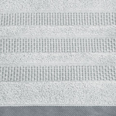 Ręcznik 50x90 Nastia srebrny z żakardową bordiurą w pasy w stylu eko frotte 500 g/m2 Eurofirany Ręcznik 50x90 Nastia srebrny z żakardową bordiurą w pasy w stylu eko frotte 500 g/m2 Eurofirany