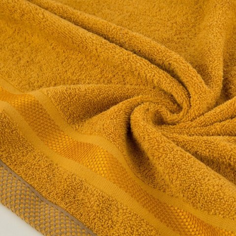 Ręcznik Abbie 100x150 żółty ciemny 500 g/m2 frotte bawełniany Eurofirany Ręcznik Abbie 100x150 żółty ciemny 500 g/m2 frotte bawełniany Eurofirany