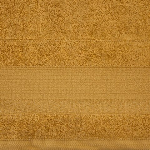 Ręcznik April 12 30x50 musztardowy z żakardową bordiurą z błyszczącą nicią 500 g/m2 Eurofirany Ręcznik April 12 30x50 musztardowy z żakardową bordiurą z błyszczącą nicią 500 g/m2 Eurofirany